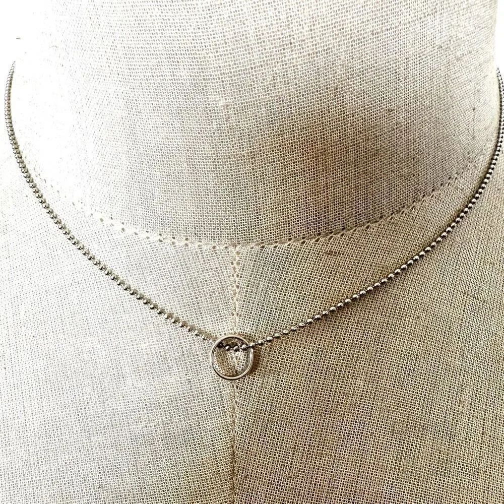Sterling silver Origami Owl Let It Go silver tone circle pendant necklace